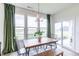 Cozy dining area filled with natural light, offering scenic views of the outdoors at 275 Hunters Ridge Dr, Danville, IN 46122