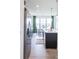 Bright kitchen with stainless steel appliances, an island, and an eat-in dining area at 275 Hunters Ridge Dr, Danville, IN 46122