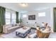 Inviting living room with modern decor and lots of natural light at 275 Hunters Ridge Dr, Danville, IN 46122