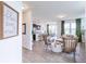 Bright open-concept living space with modern furniture and wood flooring at 275 Hunters Ridge Dr, Danville, IN 46122