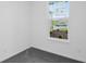 Bedroom showcasing a large window with view of the yard and landscaping at 275 Hunters Ridge Dr, Danville, IN 46122