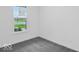 Bedroom features a large window and a carpet floor at 275 Hunters Ridge Dr, Danville, IN 46122