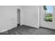 Bedroom features a window with a view and a closet with sliding doors for optimal storage at 275 Hunters Ridge Dr, Danville, IN 46122