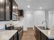 Well-equipped kitchen featuring stainless steel appliances, dark cabinets and countertops at 275 Hunters Ridge Dr, Danville, IN 46122
