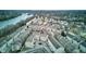 Aerial view of townhomes with private parking and landscaping near the river at 3039 Armory Dr, Indianapolis, IN 46208