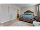 Cozy bedroom features soft carpet, and neutral walls at 3039 Armory Dr, Indianapolis, IN 46208
