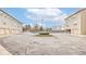 Paved parking area with mature landscaping at 3039 Armory Dr, Indianapolis, IN 46208