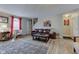 Bright living room with modern wood floors and cozy furnishings at 3039 Armory Dr, Indianapolis, IN 46208