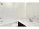Bright bathroom featuring a bathtub, a toilet, and a sink with a white countertop at 3687 Thomas Jefferson Ct, Westfield, IN 46074