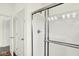 Close-up view of a glass-enclosed shower with modern fixtures and a showerhead at 3687 Thomas Jefferson Ct, Westfield, IN 46074