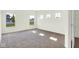 Carpeted bedroom with large windows, views and lots of natural light at 3687 Thomas Jefferson Ct, Westfield, IN 46074