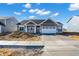 Charming single-story home with a well-manicured lawn and a two-car garage at 3687 Thomas Jefferson Ct, Westfield, IN 46074