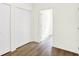 Hallway view showing an adjacent bedroom with a closet at 3687 Thomas Jefferson Ct, Westfield, IN 46074