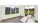 Bright sunroom with large windows and sliding glass doors at 3687 Thomas Jefferson Ct, Westfield, IN 46074