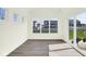 Sunroom with large windows offering views of the backyard at 3687 Thomas Jefferson Ct, Westfield, IN 46074