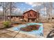 Exterior of home with a pool, patio, and lawn at 3810 Springfield Overlook St, Indianapolis, IN 46234