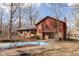 A backyard showcasing the home's exterior, patio area, and in-ground pool at 3810 Springfield Overlook St, Indianapolis, IN 46234