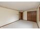 Bedroom showcasing carpet, neutral walls with a decorative border, and a closet for ample storage at 3810 Springfield Overlook St, Indianapolis, IN 46234