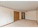 Spacious bedroom featuring a closet and a view into the hallway at 3810 Springfield Overlook St, Indianapolis, IN 46234