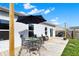 Back yard deck featuring a patio dining set and grill, perfect for outdoor cooking and dining at 4051 Presidio Cir, Indianapolis, IN 46235