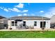 Back deck with dining and sitting area, perfect for entertaining and relaxing at 4051 Presidio Cir, Indianapolis, IN 46235