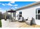 Back yard deck featuring patio furniture and grill at 4051 Presidio Cir, Indianapolis, IN 46235