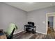 Bedroom with wood-look flooring offering versatility for an office or recreational space at 4051 Presidio Cir, Indianapolis, IN 46235