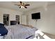 Bright main bedroom with a walk-in closet and ceiling fan at 4051 Presidio Cir, Indianapolis, IN 46235
