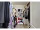 Organized walk-in closet with shelving and ample storage space for clothes and accessories at 4051 Presidio Cir, Indianapolis, IN 46235