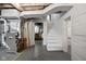 A bright, unfinished basement with white-painted walls, visible ductwork, and access to utilities at 4310 Central Ave, Indianapolis, IN 46205