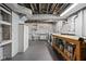 A utility space with washer, dryer, and water heater in a basement laundry area at 4310 Central Ave, Indianapolis, IN 46205
