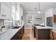 Modern kitchen with granite countertops, stainless appliances and eat at bar at 4310 Central Ave, Indianapolis, IN 46205