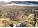 An aerial view of a beautiful and wooded parcel of land nestled in a serene neighborhood at 4543 E 700 N, Alexandria, IN 46001