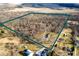 Aerial view of land for sale with potential home and other properties in the surrounding neighborhood at 4543 E 700 N, Alexandria, IN 46001
