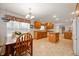 Open kitchen and dining space filled with natural light, wood accents, and a cozy, inviting atmosphere at 4543 E 700 N, Alexandria, IN 46001