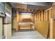Unfinished basement area with workbench perfect for storage or future customization possibilities at 4905 N Dearborn St, Indianapolis, IN 46205