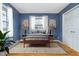 Relaxing bedroom with hardwood floors, a large window, and ample closet space creates a cozy atmosphere at 4905 N Dearborn St, Indianapolis, IN 46205