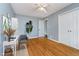 Comfortable bedroom with hardwood floors and a built-in closet offers ample storage and cozy appeal at 4905 N Dearborn St, Indianapolis, IN 46205