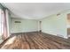Expansive living room with hardwood floors and plenty of natural light at 4905 N Dearborn St, Indianapolis, IN 46205