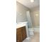 Bathroom with vanity, sink, toilet, and tub with shower and shower curtain at 540 Louise Dr, Indianapolis, IN 46217