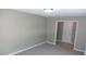Bedroom featuring neutral walls, carpet flooring, and bright windows at 540 Louise Dr, Indianapolis, IN 46217
