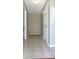 Inviting hallway featuring ceramic tile flooring and neutral paint at 540 Louise Dr, Indianapolis, IN 46217