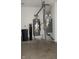 Utility room featuring a water heater, furnace, water softener and concrete floor at 540 Louise Dr, Indianapolis, IN 46217