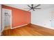 Bedroom featuring hardwood floors, a ceiling fan, and an open closet space at 5630 N Rockingham Ln, McCordsville, IN 46055
