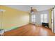 Bedroom featuring hardwood floors, natural light, ceiling fan, and bright walls at 5630 N Rockingham Ln, McCordsville, IN 46055