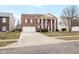 Beautiful brick two-story home with attached garage, landscaped front yard and ample driveway at 5630 N Rockingham Ln, McCordsville, IN 46055