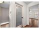 Hallway with decorative Laundry door at 5630 N Rockingham Ln, McCordsville, IN 46055