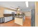 Bright kitchen showcasing the island, granite countertops, and stainless appliances at 5630 N Rockingham Ln, McCordsville, IN 46055