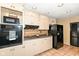 Clean kitchen with ample cabinet space and granite countertops at 5924 Elaine St, Indianapolis, IN 46224
