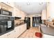 Well-lit kitchen with stainless steel appliances and tile backsplash at 5924 Elaine St, Indianapolis, IN 46224